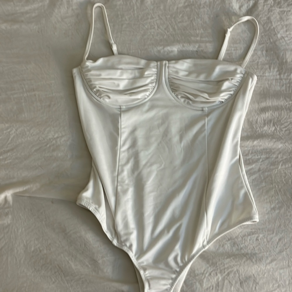 Revolve super down white bodysuit